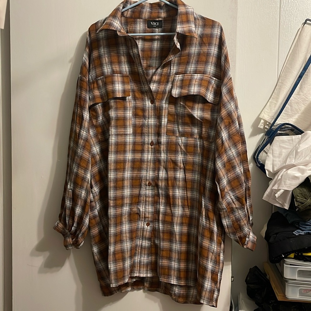 Cute Large plaid over size button up long sleeve dress.